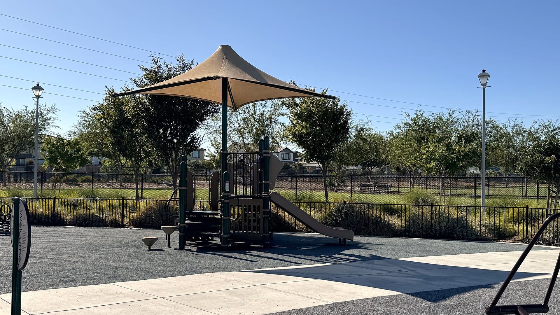 Shaded playground at the neighborhood park